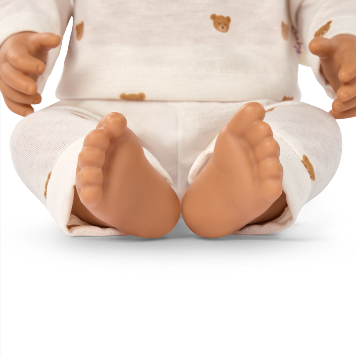 LullaBaby boy doll with brown hair in teddy bear outfit