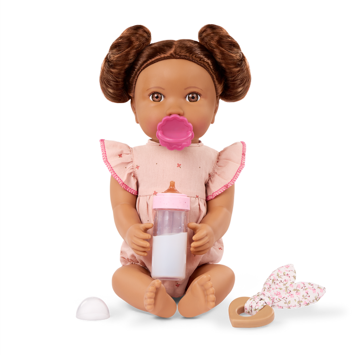 LullaBaby doll with brown hair in pink outfit
