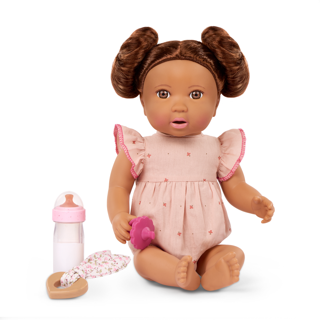 LullaBaby doll with brown hair in pink outfit