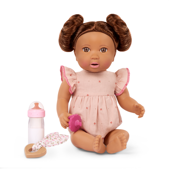 LullaBaby doll with brown hair in pink outfit